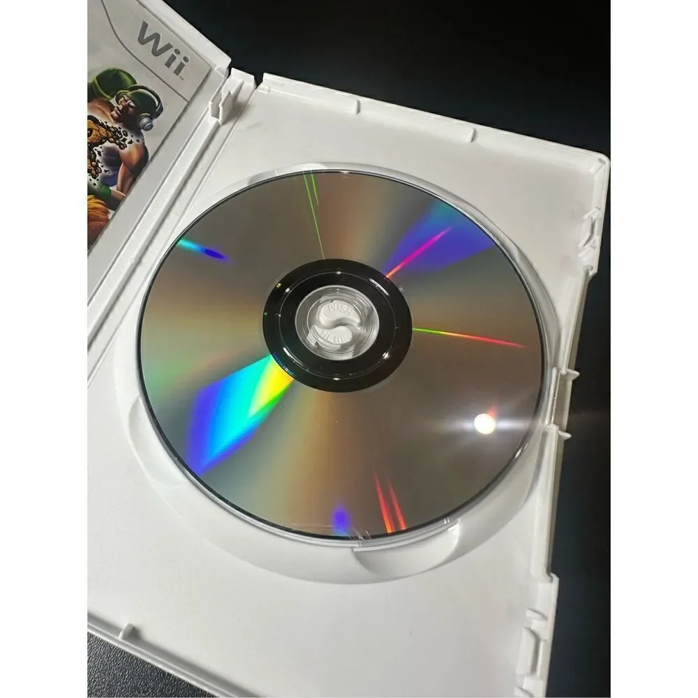 Nintendo Wii Facebreaker K.O. Party video game complete with manual